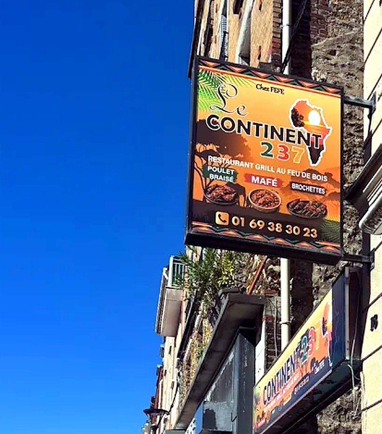 Enseigne suspendue du restaurant Le Continent 237, Grande Rue à Juvisy-sur-Orge